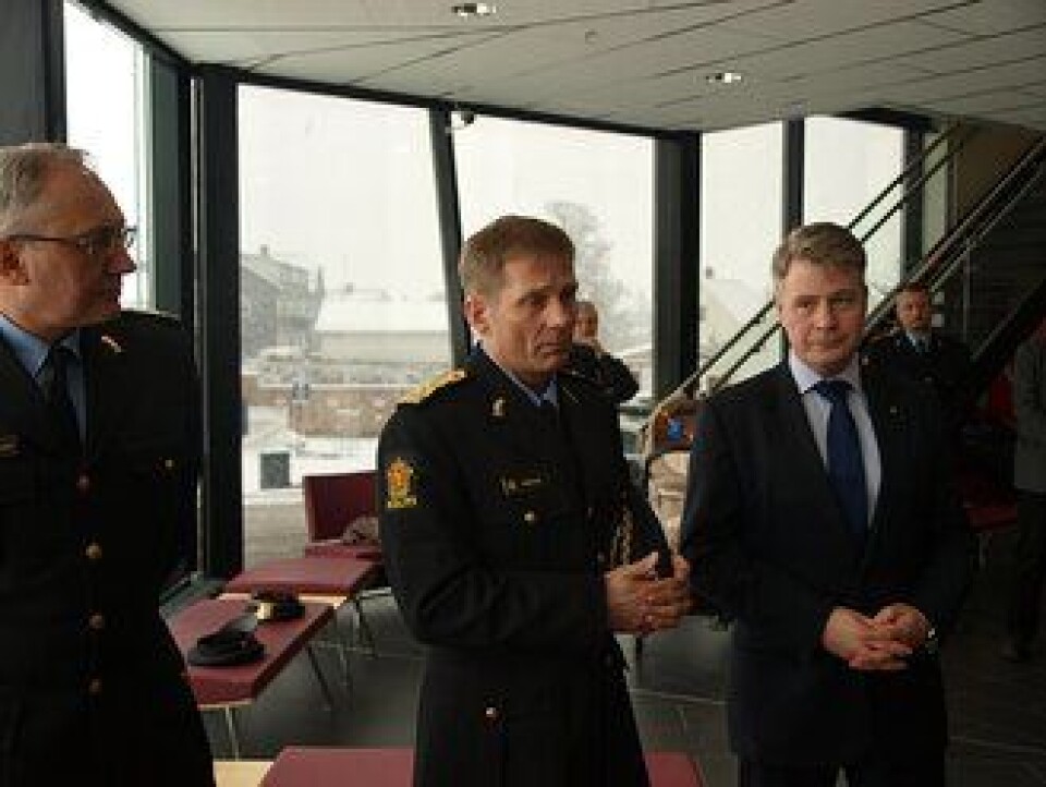 Politimester Johan Brekke (i midten)
