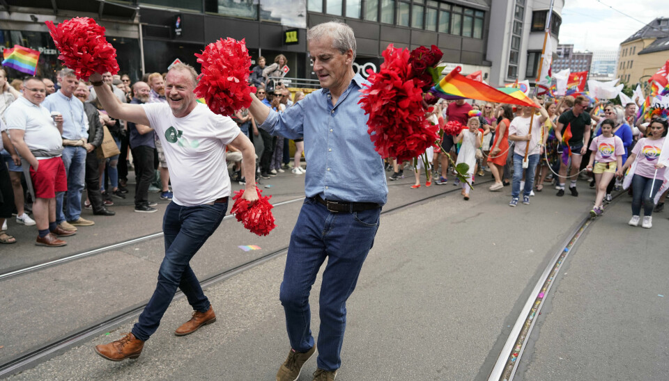 Byrådsleder i Oslo, Raymond Johansen (Ap), og Jonas Gahr Støre, den gang ikke statsminister, under Pride-paraden i 2019.